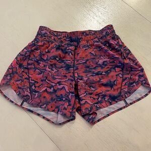 Lululemon Track That High-Rise Lined Short 5in. Size 8. Color: pink and blue.